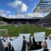 fans holding up black white sheets sjp newcastle united nufc 1120 768x432 1