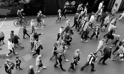 fans walking towards milburn stand from above matchday sjp newcastle united nufc bw 1120 768x432 1