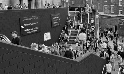 fans walking up stairs to gallowgate corner sjp matchday newcastle united nufc bw 1120 768x432 1