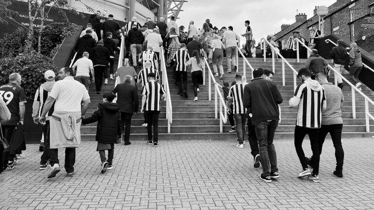 fans walking up stairs sjp matchday newcastle united nufc 1 bw 1120 768x432 1