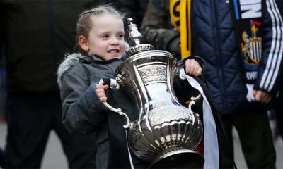 young fan lifting fa cup newcastle united nufc 1120x1410 1 768x432 1