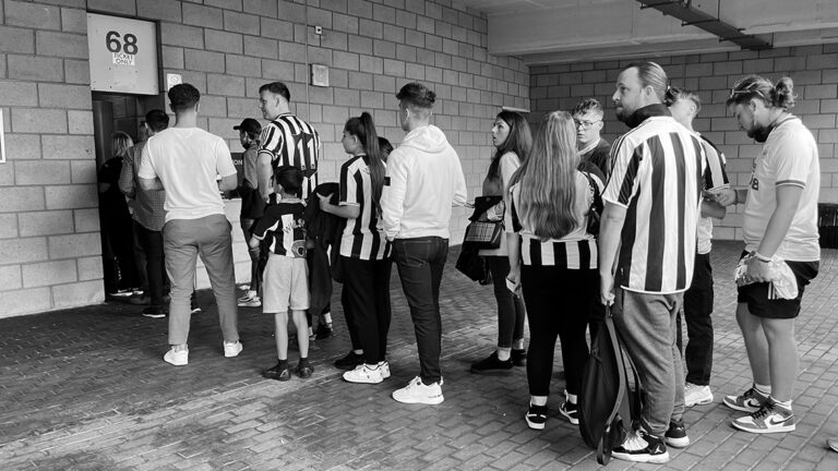 fans queuing outside turnstile matchday sjp newcastle united nufc bw 1120 768x432 1