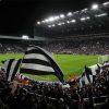 flag waving fans before game night match sjp newcastle united nufc 1120 768x432 1