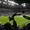 scarf waving fans sjp night game newcastle united nufc 1120x1493 1 768x432 1