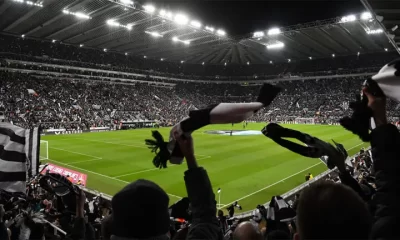 scarf waving fans sjp night game newcastle united nufc 1120x1493 1 768x432 1